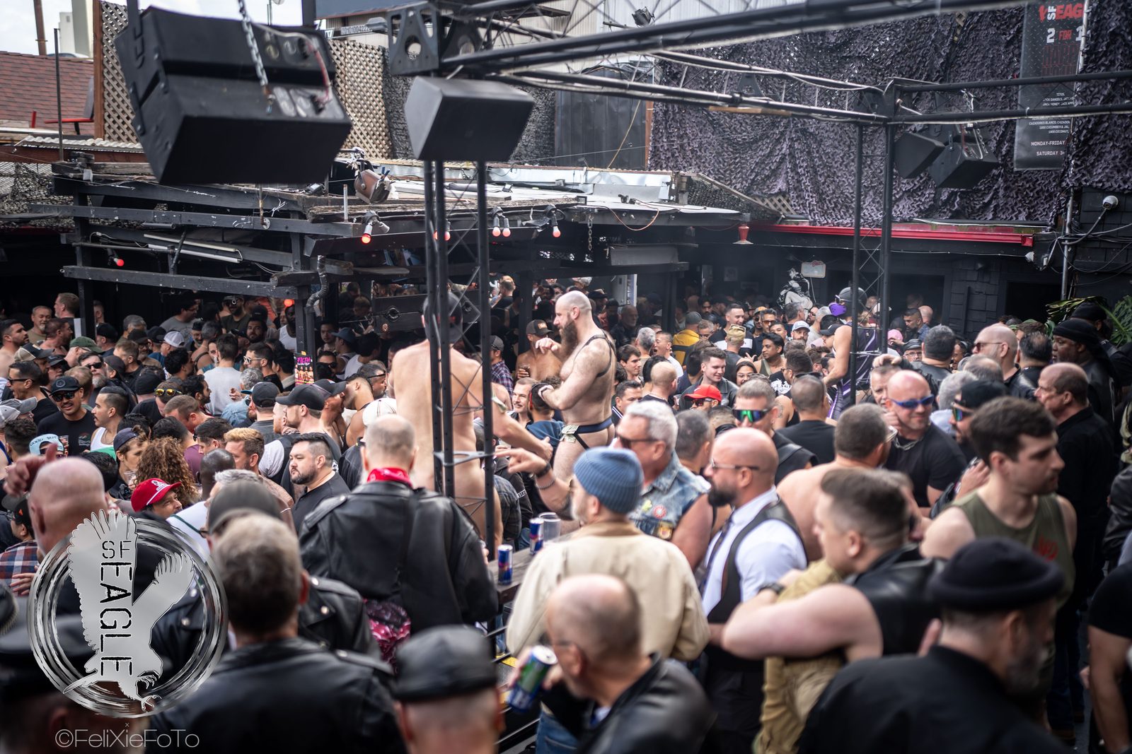 A packed crowd of big guys at an SF Eagle anniversary, photographed by Felix Xie